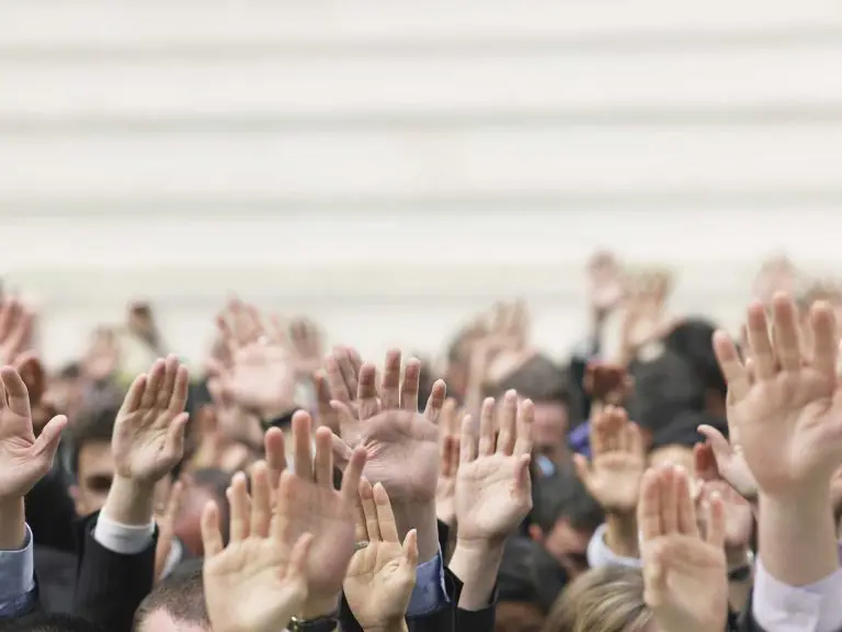 People raising their hand