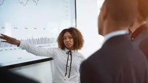 Person presenting a graph