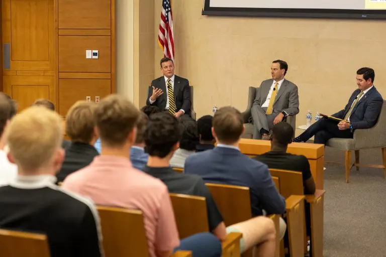 WFU alum Paul Griggs chatting with business students