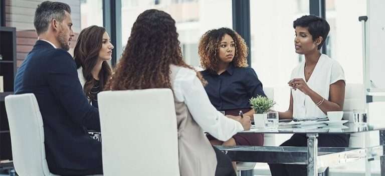 Meeting taken place at a table.