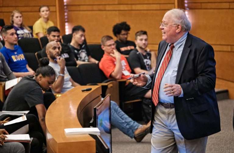 Wake Forest business professor Roger Beahm discusses key points with students during the MSM orientation.