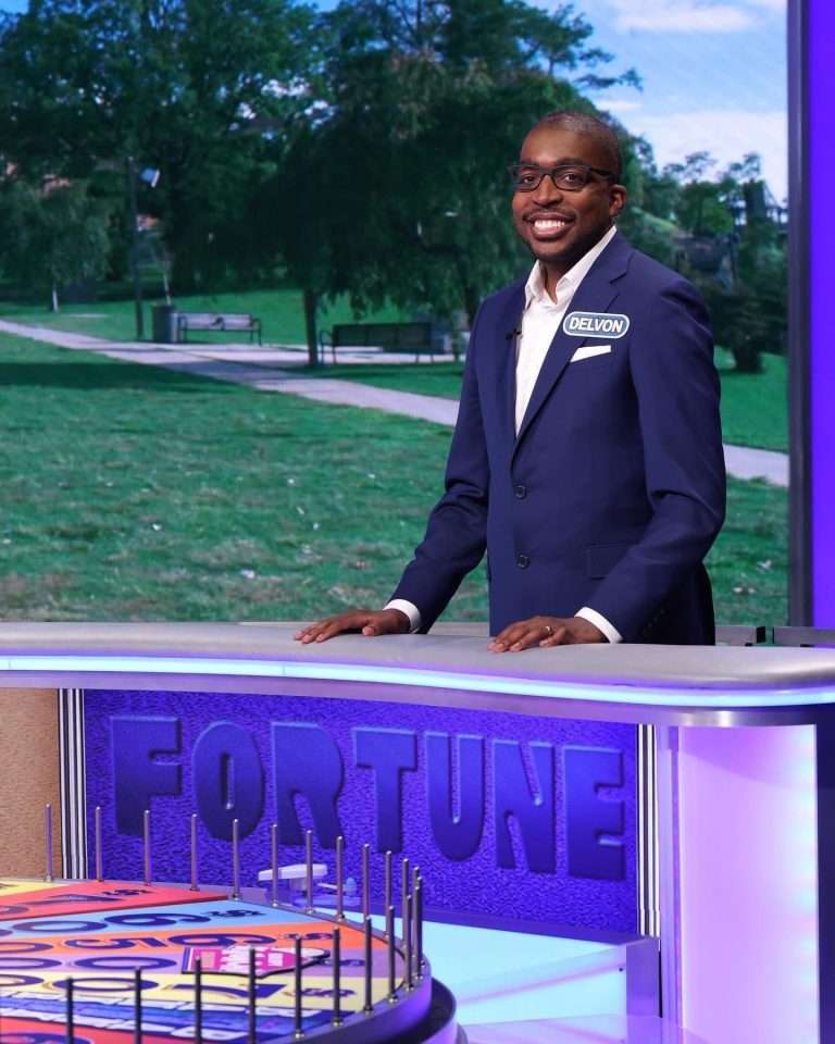 Delvon Worthy Smiling participating on "wheel of fortune".