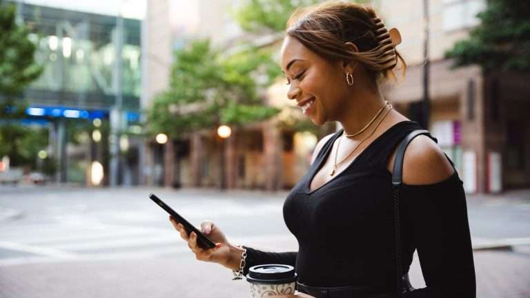woman looking at a cellphone