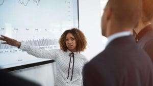 Person presenting a graph