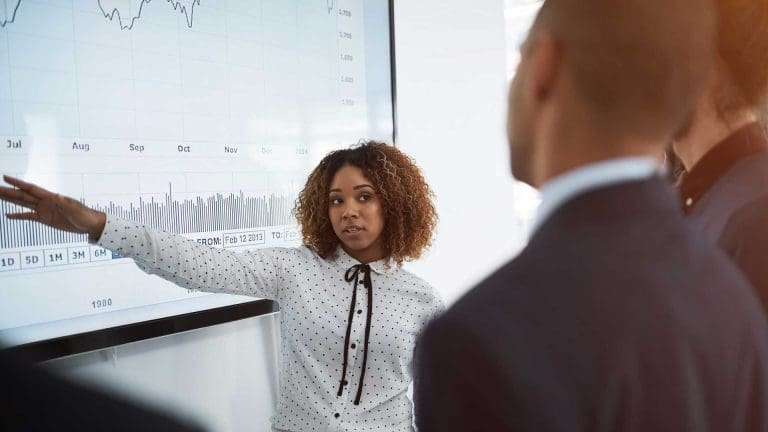 Person presenting a graph
