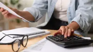 Person on a calculator 