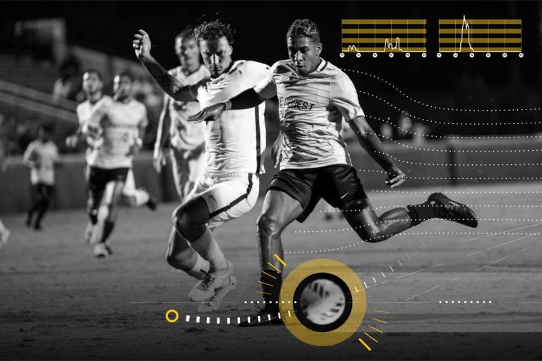 An image of Wake Forest Men's Soccer players in mid game