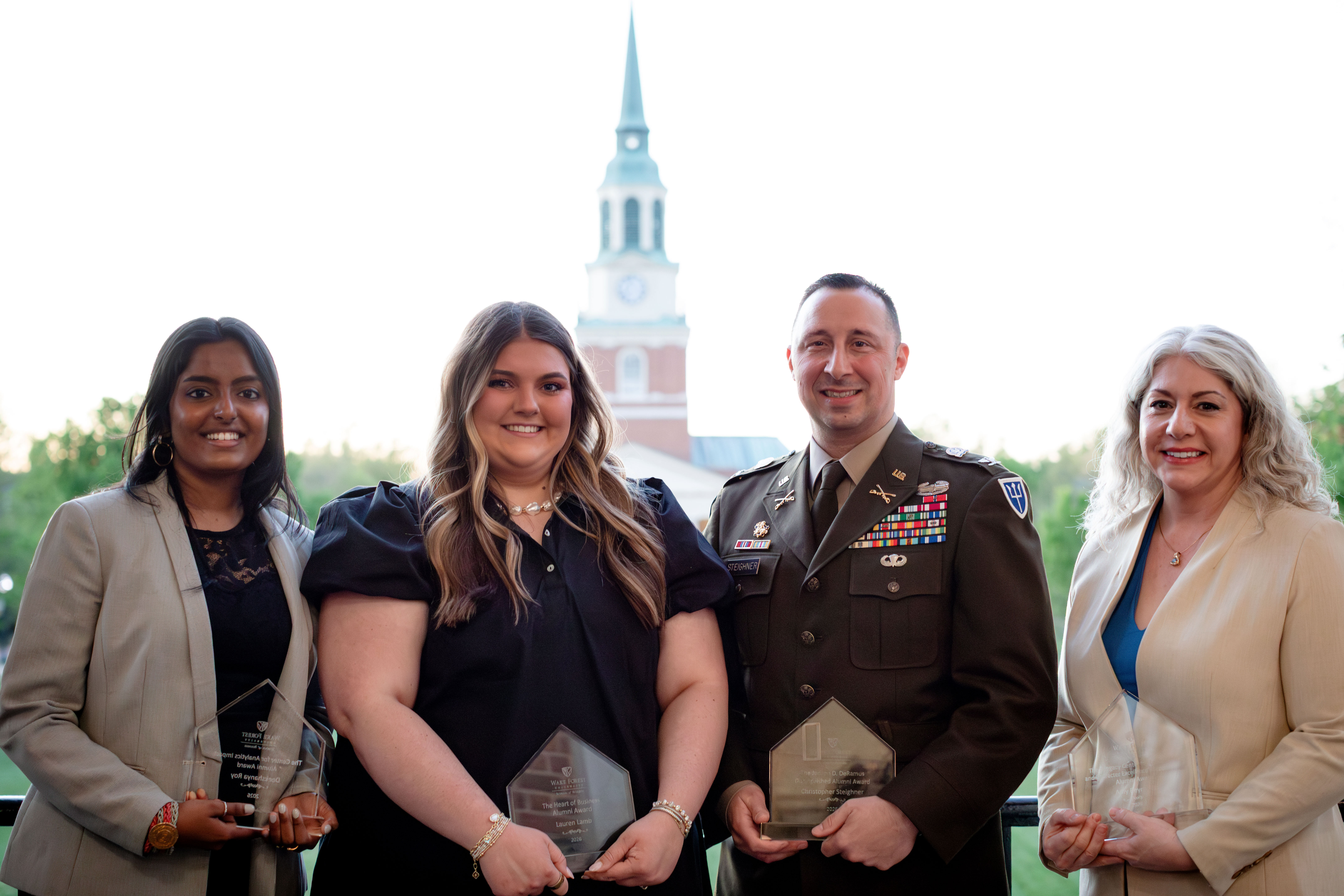 2026 alumni award winners with Wait Chapel in the background on Wake Forest's Reynolda Campus