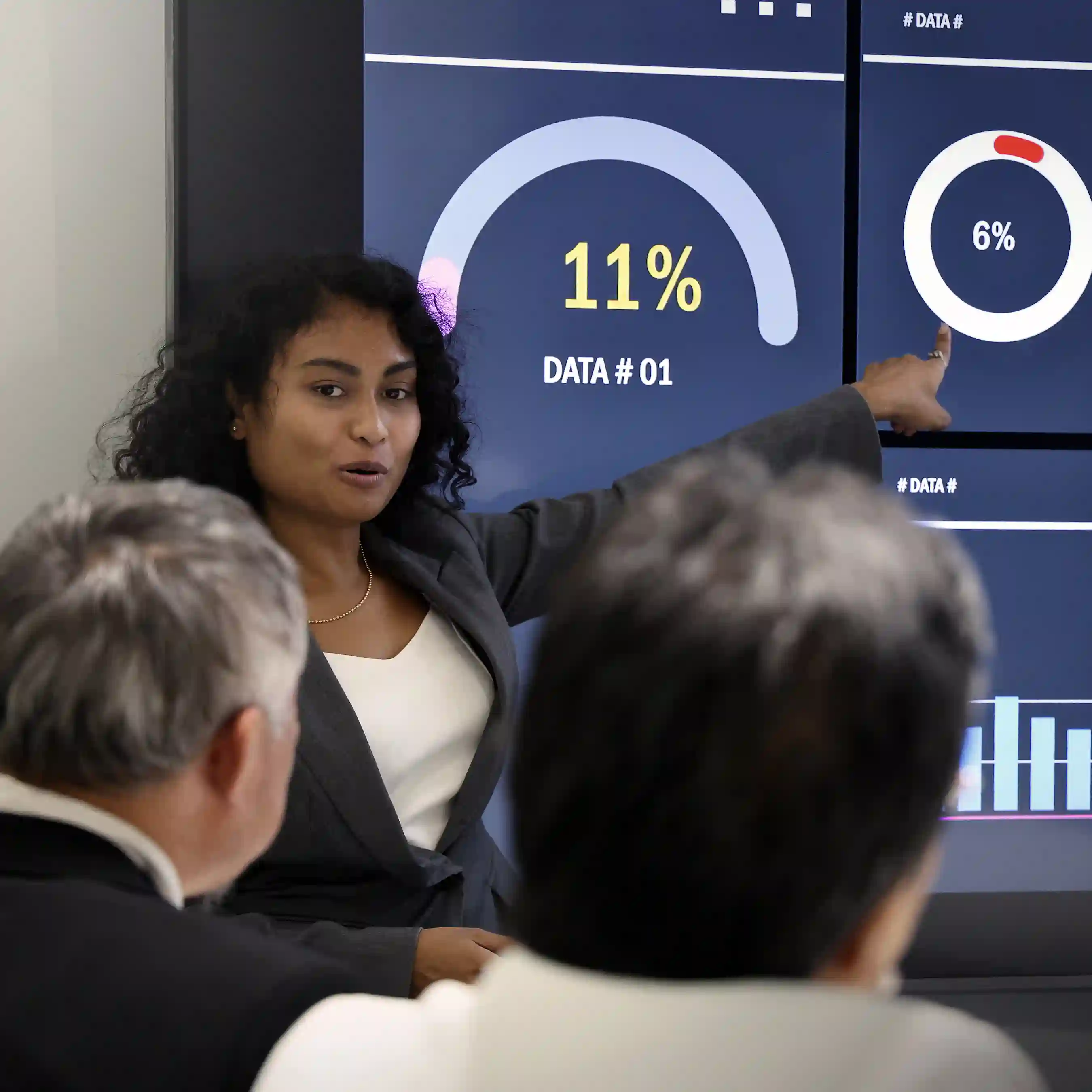 A cropped photo of a woman making a presentation of her business analytics recommendations