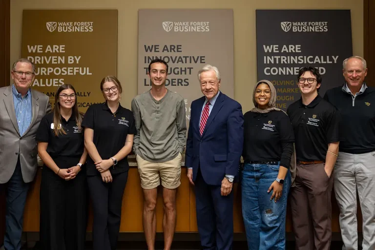 The 2026 AFCLC Scholars posing with Winston-Salem Mayor Allen Joines and Pat Sweeney.